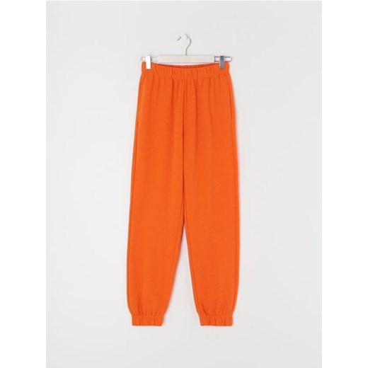 Sinsay - Spodnie dresowe - pomarańczowy Sinsay XL promocyjna cena Sinsay