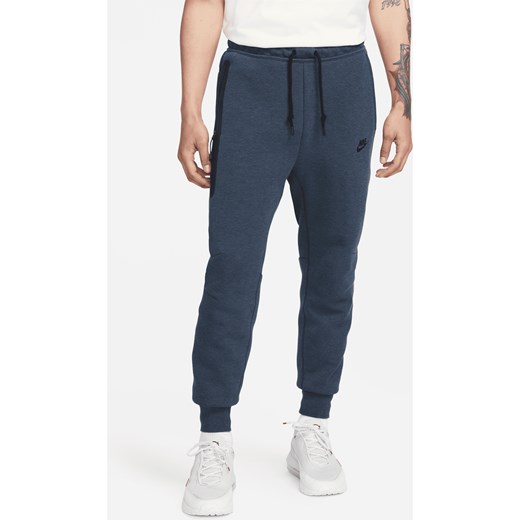 Joggery męskie Nike Sportswear Tech Fleece - Niebieski ze sklepu Nike poland w kategorii Spodnie męskie - zdjęcie 161708253