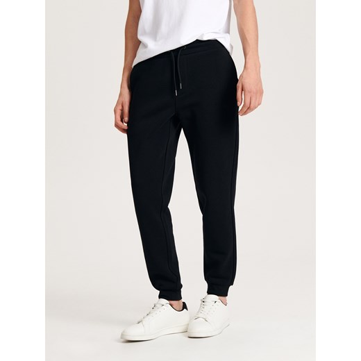 Spodnie męskie Reserved na jesień 