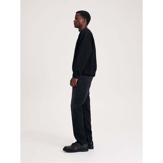 Czarne jeansy męskie Reserved