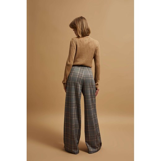 Spodnie w kratę z szerokimi nogawkami XL Moodo.pl
