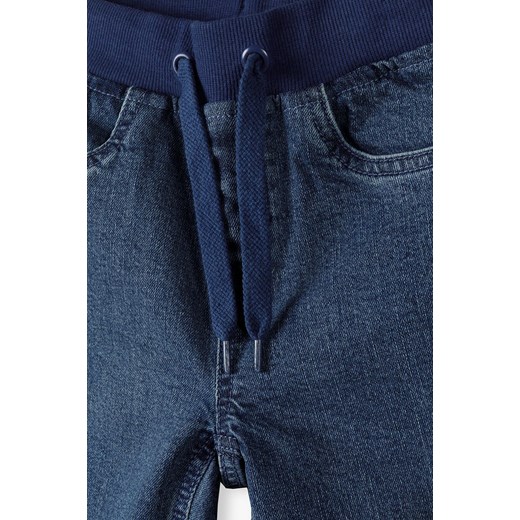 Spodnie jeansowe dla chłopca fason straight leg - niebieskie Lincoln & Sharks By 5.10.15. 134 5.10.15 wyprzedaż