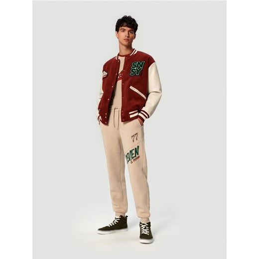 Sinsay - Spodnie dresowe comfort - kremowy ze sklepu Sinsay w kategorii Spodnie męskie - zdjęcie 162354543