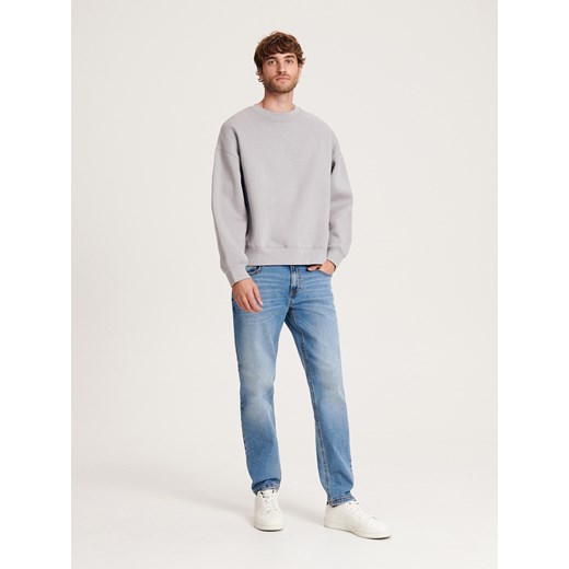 Reserved - Jeansy slim z efektem sprania - niebieski Reserved 34/34 Reserved