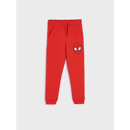 Sinsay - Spodnie dresowe jogger Spiderman - czerwony Sinsay 116 Sinsay wyprzedaż