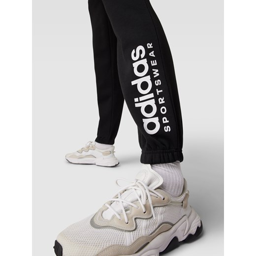Spodnie dresowe z tunelem Adidas Sportswear S wyprzedaż Peek&Cloppenburg 