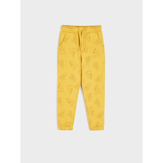 Żółte spodnie chłopięce Sinsay 
