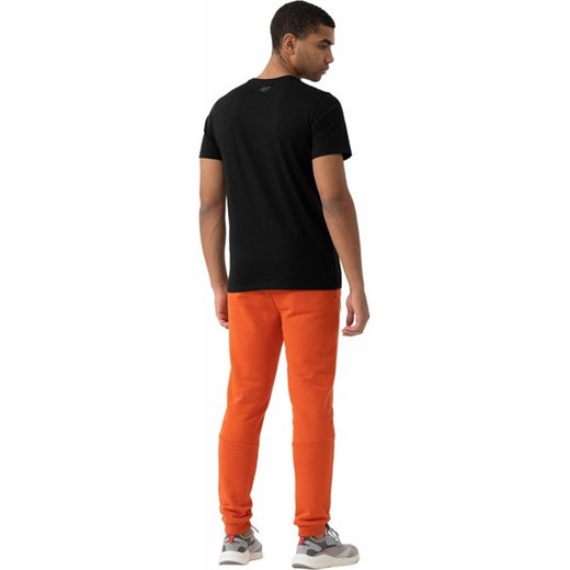 Pomarańczowe spodnie męskie 4F 