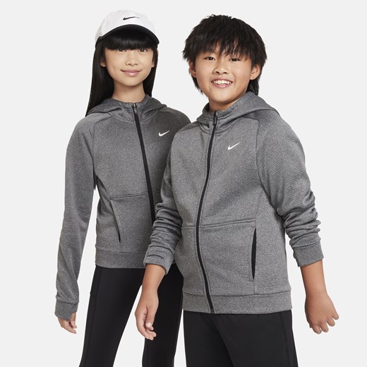 Bluza z kapturem i zamkiem na całej długości dla dużych dzieci Nike Therma-FIT - Czerń ze sklepu Nike poland w kategorii Bluzy chłopięce - zdjęcie 163429150