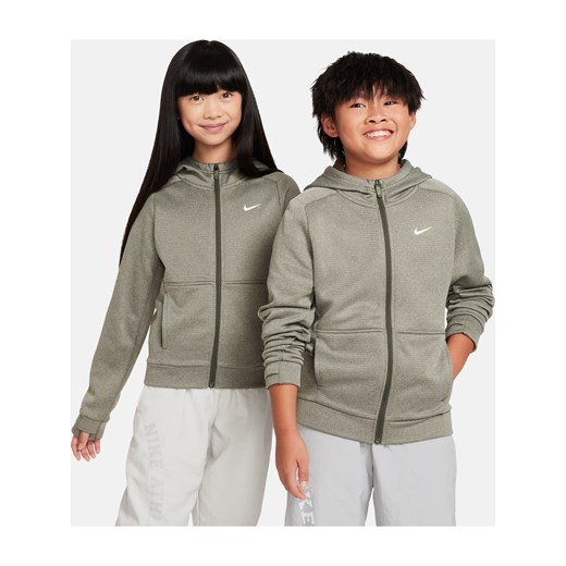 Bluza z kapturem i zamkiem na całej długości dla dużych dzieci Nike Therma-FIT - Zieleń ze sklepu Nike poland w kategorii Bluzy chłopięce - zdjęcie 163460182