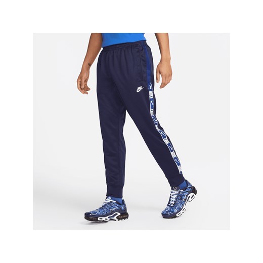 Joggery męskie Nike Sportswear - Niebieski Nike L Nike poland