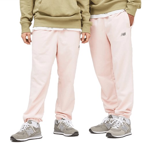 Spodnie New Balance UP21500PIE - różowe ze sklepu streetstyle24.pl w kategorii Spodnie męskie - zdjęcie 163540380