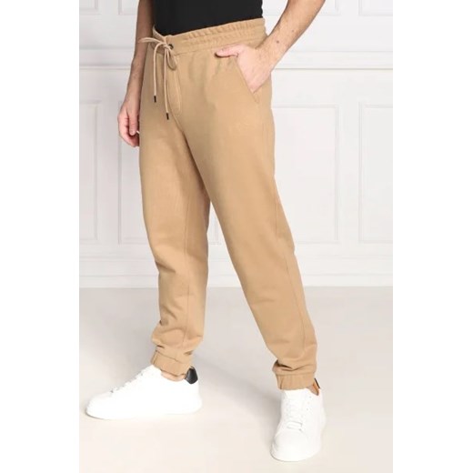 BOSS Spodnie dresowe Levete 101 | Oversize fit M promocyjna cena Gomez Fashion Store