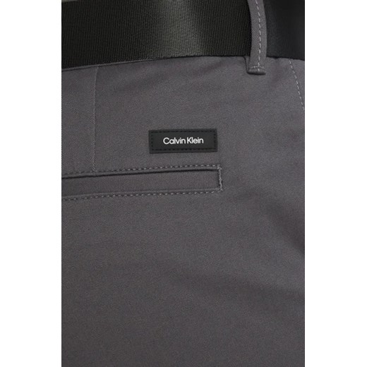 Calvin Klein Spodnie chino + pasek MODERN TWILL | Slim Fit Calvin Klein 34/32 promocyjna cena Gomez Fashion Store