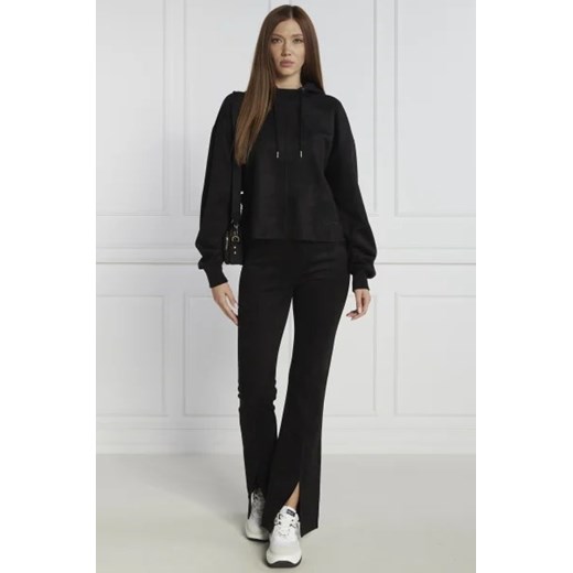 GUESS JEANS Spodnie dresowe STELA | flare fit L Gomez Fashion Store
