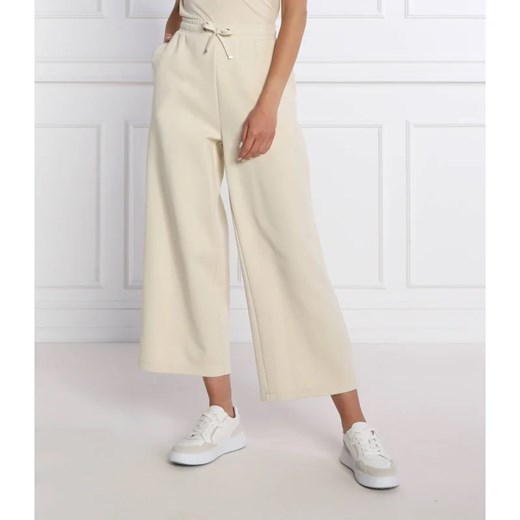 Calvin Klein Spodnie dresowe | flare fit Calvin Klein S promocja Gomez Fashion Store