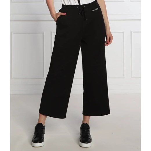 Calvin Klein Spodnie dresowe | flare fit Calvin Klein S promocja Gomez Fashion Store