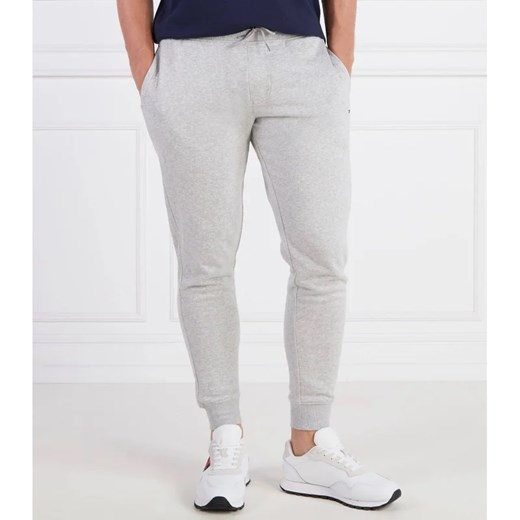 Tommy Jeans Spodnie dresowe TJM SLIM FLEECE SWEA | Slim Fit ze sklepu Gomez Fashion Store w kategorii Spodnie męskie - zdjęcie 164331990