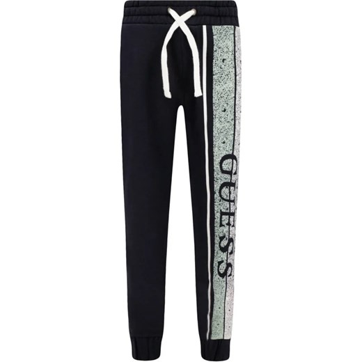 Guess Spodnie dresowe | Regular Fit ze sklepu Gomez Fashion Store w kategorii Spodnie chłopięce - zdjęcie 164332114