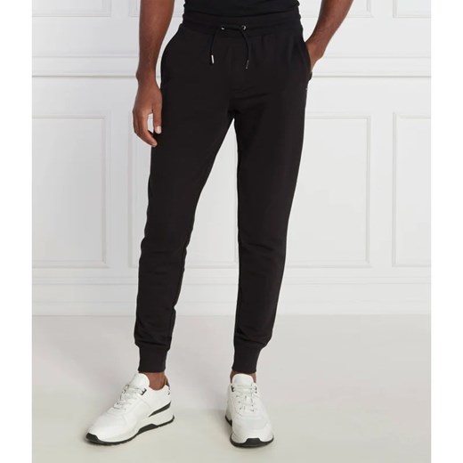 Tommy Hilfiger Spodnie dresowe | Regular Fit ze sklepu Gomez Fashion Store w kategorii Spodnie męskie - zdjęcie 164337510