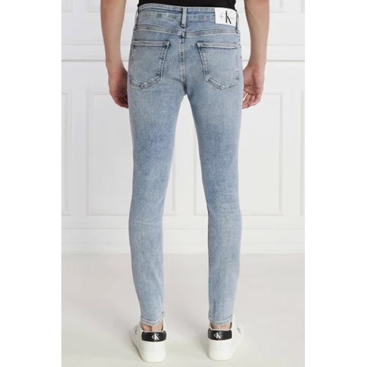 Niebieskie jeansy męskie Calvin Klein 