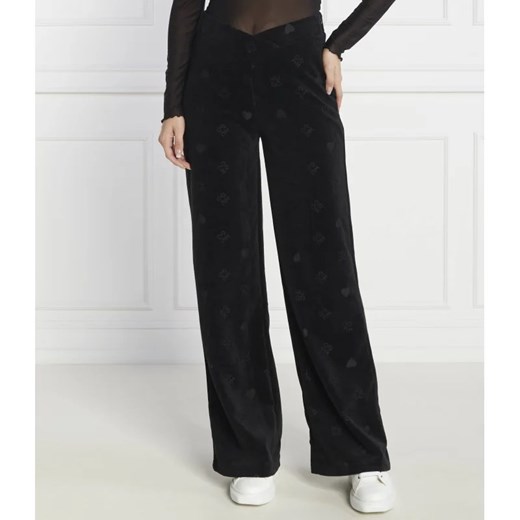 HUGO Spodnie dresowe Navalia | flare fit ze sklepu Gomez Fashion Store w kategorii Spodnie damskie - zdjęcie 164940761