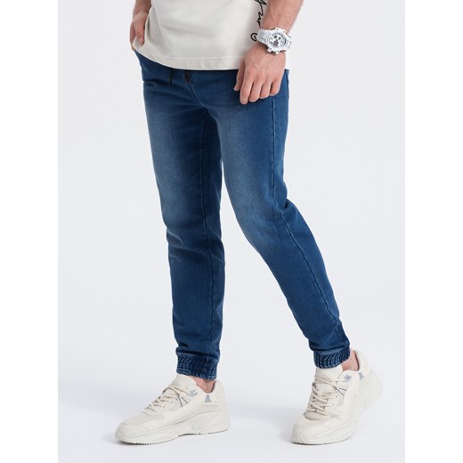 Spodnie męskie jeansowe JOGGER SLIM FIT - ciemnoniebieskie V3 OM-PADJ-0134 ze sklepu ombre w kategorii Jeansy męskie - zdjęcie 165015750