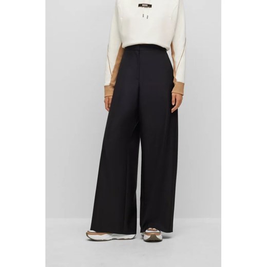 BOSS BLACK Wełniane spodnie Tilwida Alica | flare fit ze sklepu Gomez Fashion Store w kategorii Spodnie damskie - zdjęcie 165173432
