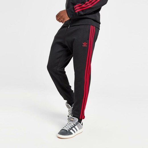 ADIDAS SPODNIE SSTAR TP BLK/RED S okazyjna cena JD Sports