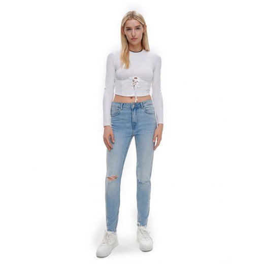 Cropp - Jasne jeansy skinny z dziurami - niebieski Cropp 38 Cropp promocyjna cena