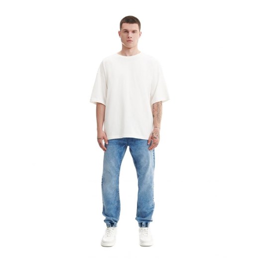 Cropp - Niebieskie jeansy jogger - niebieski ze sklepu Cropp w kategorii Jeansy męskie - zdjęcie 165503240