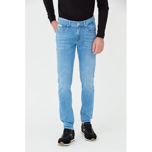 7 FOR ALL MANKIND Jeansy niebieskie Slimmy Tapered, Rozmiar 33 ze sklepu outfit.pl w kategorii Jeansy męskie - zdjęcie 165577624