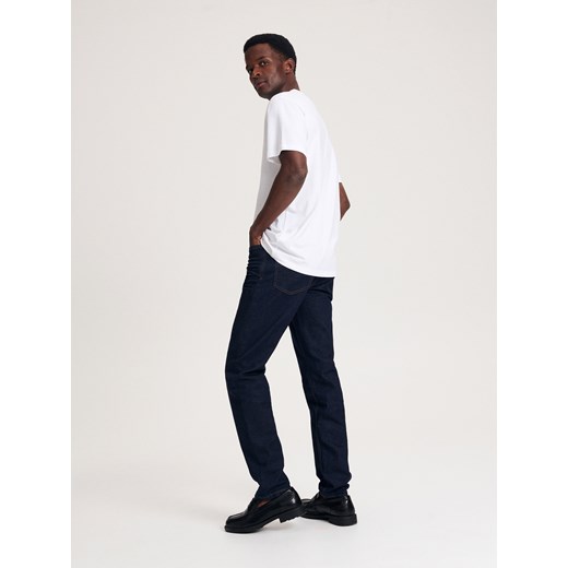 Reserved - Jeansy slim z efektem sprania - granatowy Reserved 33/32 Reserved