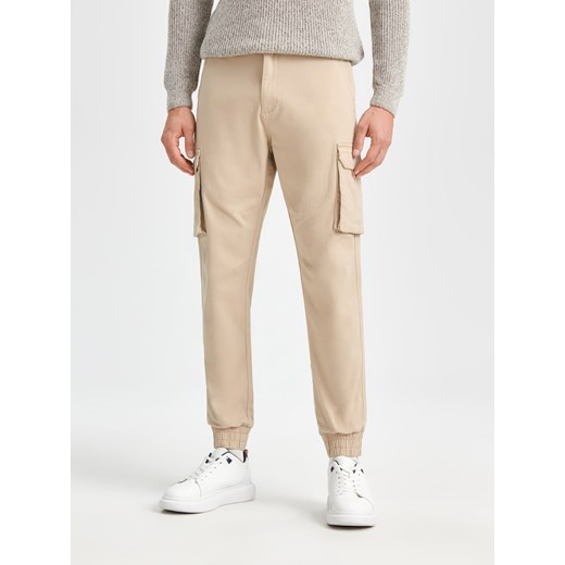 Sinsay - Spodnie jogger - kremowy Sinsay 28 Sinsay