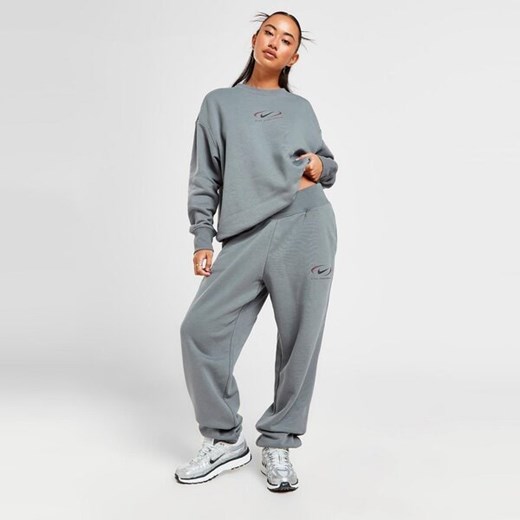 NIKE SPODNIE NSW PHNX FLC HR OS PANT PRNT ze sklepu JD Sports  w kategorii Spodnie damskie - zdjęcie 166024304