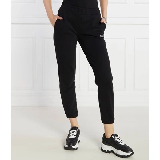 GUESS ACTIVE Spodnie dresowe ELEANORA | Regular Fit ze sklepu Gomez Fashion Store w kategorii Spodnie damskie - zdjęcie 166407564