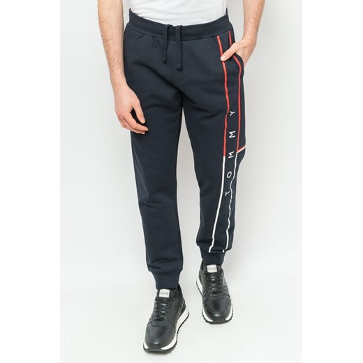 spodnie dresowe męskie tommy jeans mw0mw25050 granatowe ze sklepu Royal Shop w kategorii Spodnie męskie - zdjęcie 166428074
