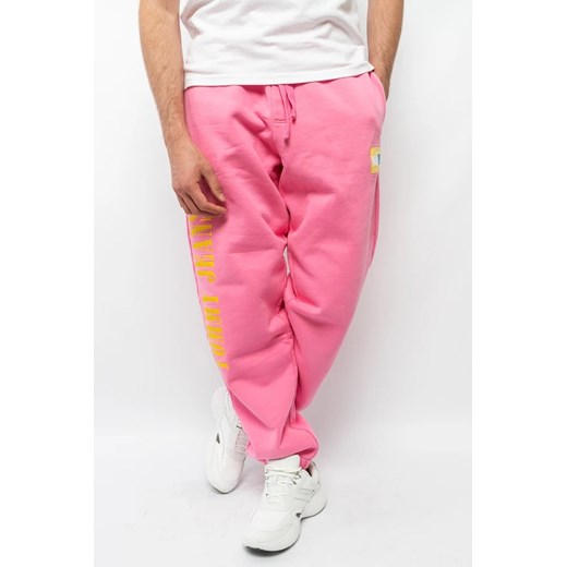 spodnie dresowe męskie tommy jeans dm0dm14931 różowy ze sklepu Royal Shop w kategorii Spodnie męskie - zdjęcie 166432630