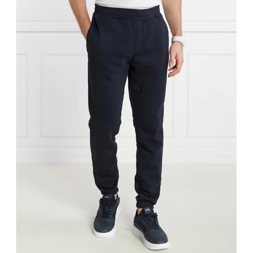 Tommy Hilfiger Spodnie dresowe GLOBAL STRIPE | Regular Fit ze sklepu Gomez Fashion Store w kategorii Spodnie męskie - zdjęcie 166592624