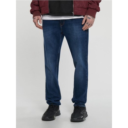Cropp - Niebieskie jeansy slim - granatowy Cropp 28/30 Cropp