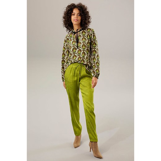 Aniston Spodnie w kolorze zielonym ze sklepu Limango Polska w kategorii Spodnie damskie - zdjęcie 167403210