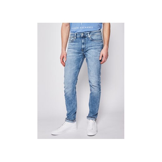 Calvin Klein Jeans Jeansy Slim Fit J30J314614 Niebieski Taper Fit 34_32 promocyjna cena MODIVO