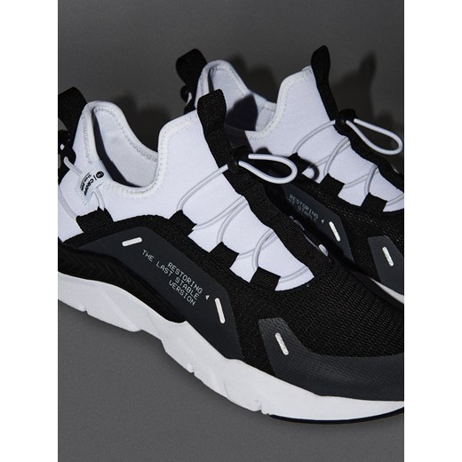 Cropp - Kontrastowe sneakersy z efektem reflective - biały Cropp 42 Cropp