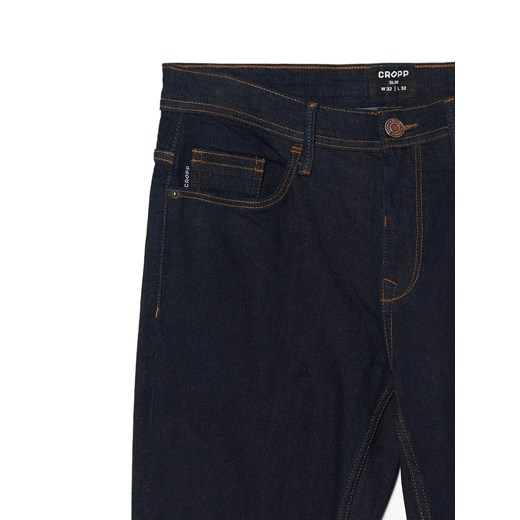 Cropp - Granatowe jeansy slim - surowy granatowy ze sklepu Cropp w kategorii Jeansy męskie - zdjęcie 167772704