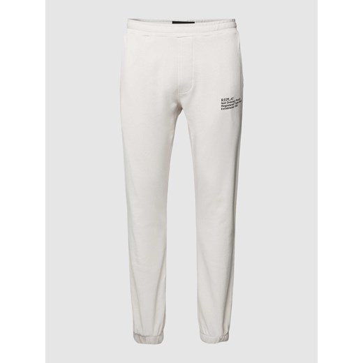 Spodnie dresowe z nadrukiem z logo ze sklepu Peek&Cloppenburg  w kategorii Spodnie męskie - zdjęcie 167877184