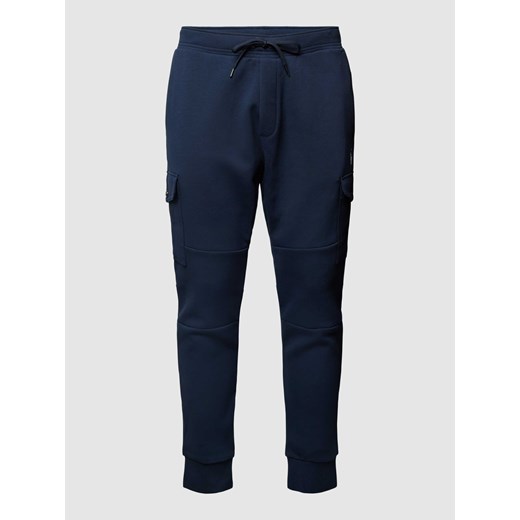 Spodnie dresowe z detalem z logo w jednolitym kolorze ze sklepu Peek&Cloppenburg  w kategorii Spodnie męskie - zdjęcie 167931302