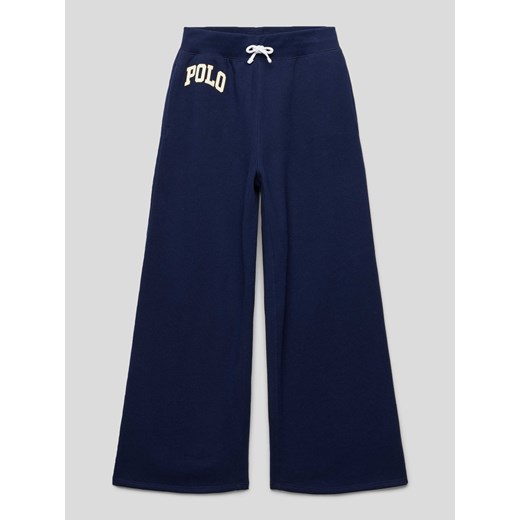 Spodnie dresowe z nadrukiem z logo ze sklepu Peek&Cloppenburg  w kategorii Spodnie dziewczęce - zdjęcie 168092470