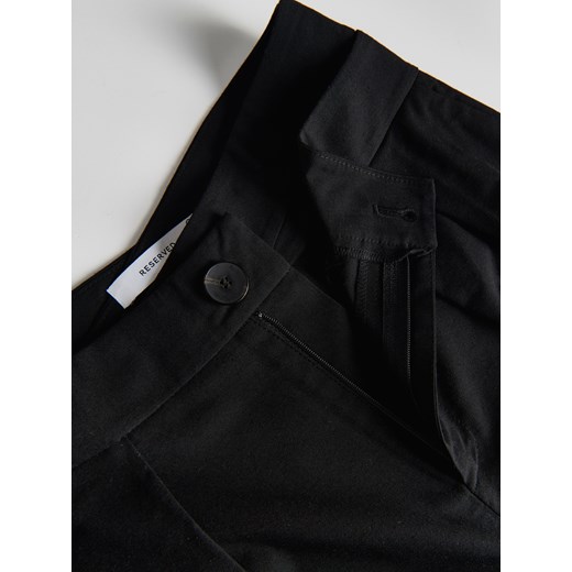 Reserved - Spodnie z asymetrycznym pasem - czarny Reserved 36 Reserved