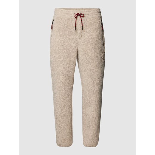 Spodnie dresowe z detalem z logo model ‘Danilong’ ze sklepu Peek&Cloppenburg  w kategorii Spodnie męskie - zdjęcie 168257874