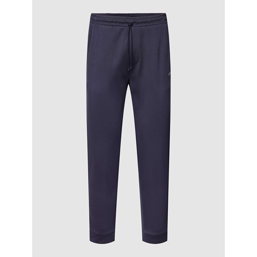 Spodnie dresowe z drobnym,fakturowanym wzorem ze sklepu Peek&Cloppenburg  w kategorii Spodnie męskie - zdjęcie 168273682